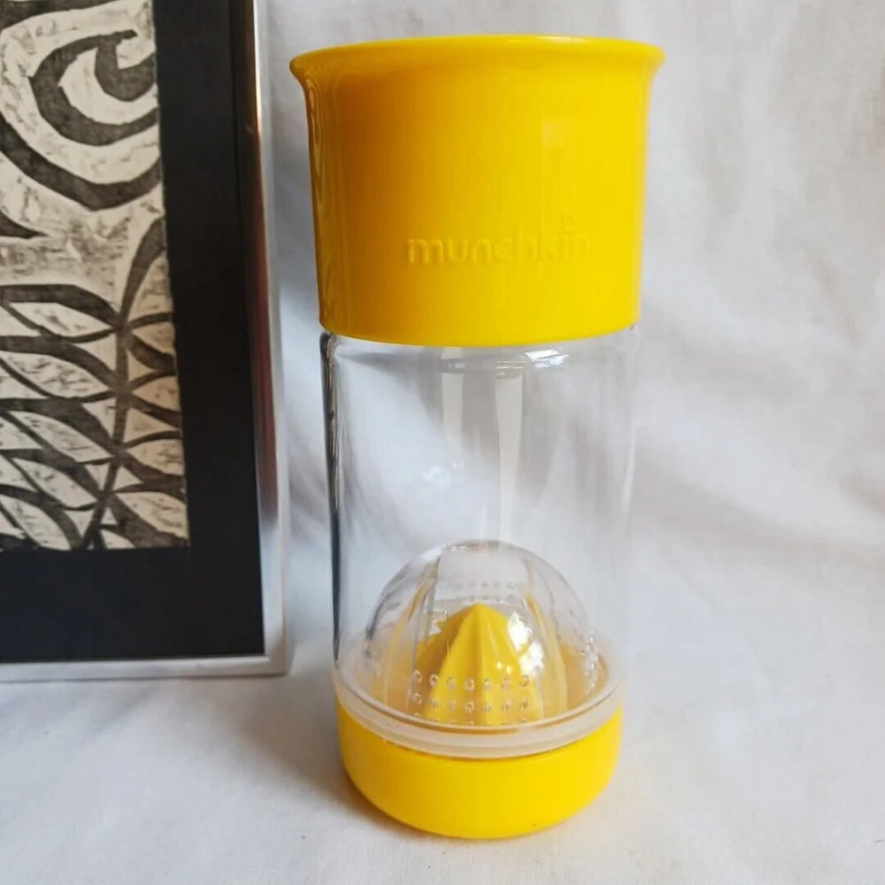 Munchkin Yellow Plastic Portable Citrus Juicer